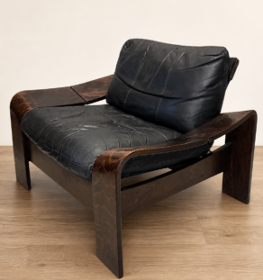 Paire de fauteuils scandinaves en cuir et palissandre